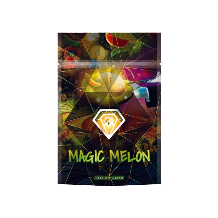 Diamond Concentrates Shatter "Magic Melon" packaging with a psychedelic design featuring vibrant fruits, including a melon, over a dark background with geometric patterns.