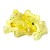A collection of multiple 2.5-inch Soft Glass Blunt Pipes in various yellow shades, stacked together