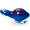 A small blue animal-shaped glass pipe resembling a turtle, with red swirls on its back.