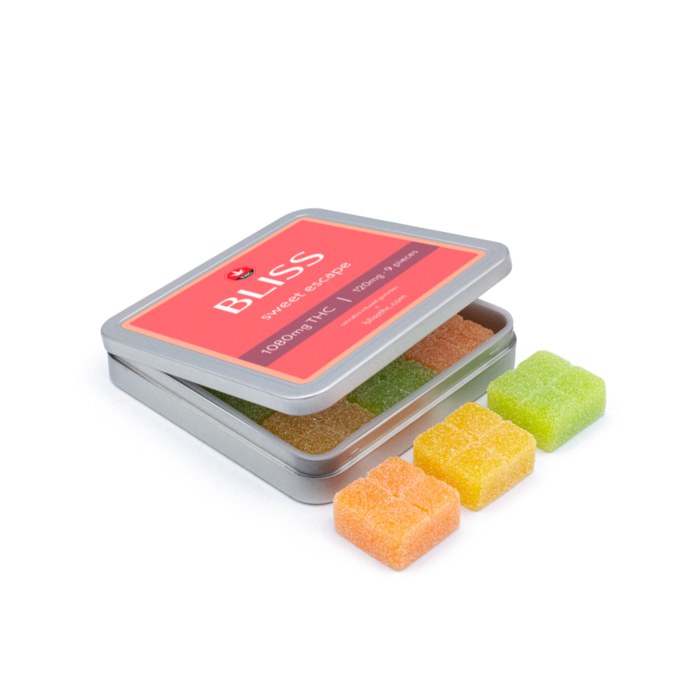 Bliss Daydream gummies in a square tin with three brightly colored square gummies in shades of red and blue, each containing 120mg THC