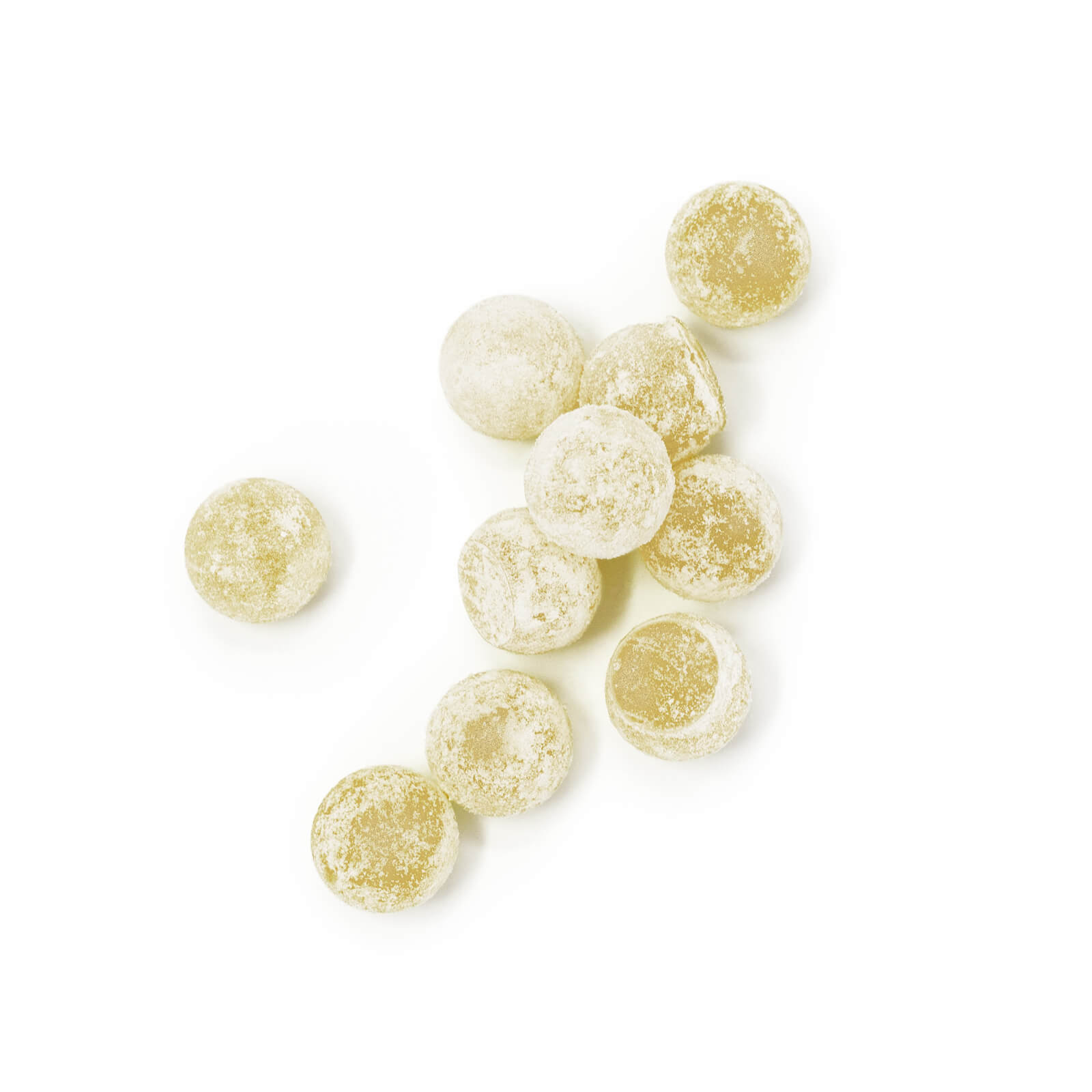 Close-up of yellow round Pineapple Thunder gummies, sprinkled with sugar