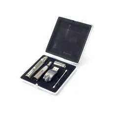 Open Dank Astro Wax Concentrate Pen kit showing the pen, USB charger, dab tool, and replacement coil in a compact, foam-lined case.
