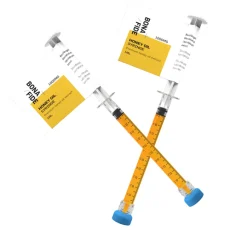 Two syringes filled with amber honey oil crossed together, labeled as Bonafide Honey Oil Syringe with 1000mg cannabis extract.