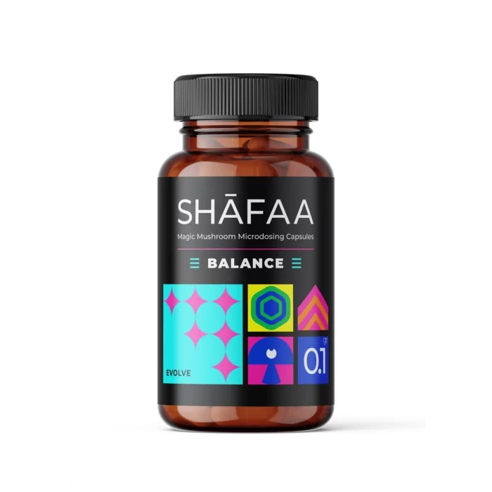 The front of the SHAFAA Balance Microdosing Psilocybin Capsules bottle, labeled with vibrant geometric shapes and text indicating a 0.1g dosage per capsule