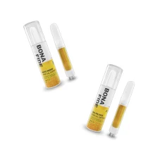 Two Bonafide Honey Oil Vape Cartridges, one labeled "White Widow" and the other "MAC Pie Face." Both are accompanied by the clear, golden-hued oil-filled cartridges with white tips