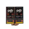 Two Shatter Bars 1200mg THC packages in Toffee Crunch flavor, available in Sativa and Indica varieties, with chocolate squares shown in front of the packaging.
