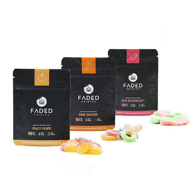 Three Faded Edibles packages: Peach Drops (180mg THC), Sour Suckers (180mg THC), and Wild Watermelons (180mg THC), with various shaped gummies displayed in front.