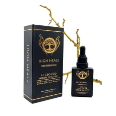 High Heals Deep Healing CBG and CBD Tincture packaging and tincture bottle displayed with a natural branch background. The black box and bottle feature gold accents with a tree of life design and display '1:1 CBG Herbal Tincture' with 1000mg of CBG and 1000mg of CBD