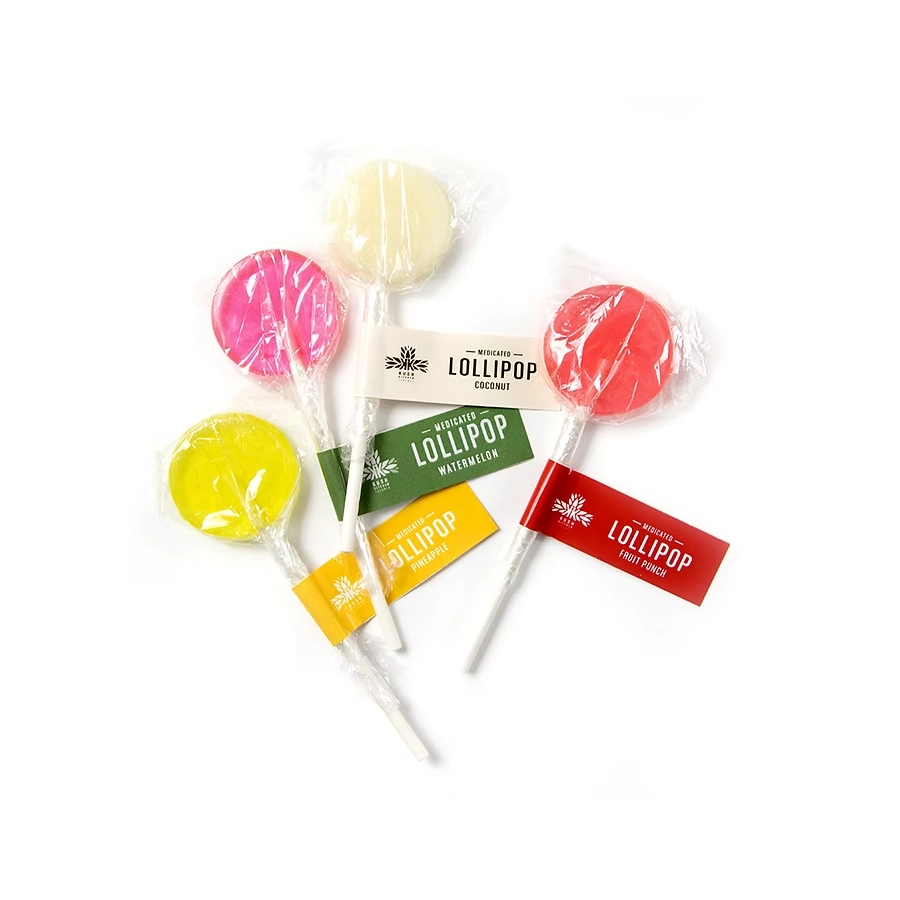 Assorted THC-infused Kush Kitchen lollipops in coconut, watermelon, pineapple, and fruit punch flavors.