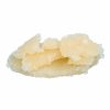 Close-up view of Kush Kraft Sugar Wax concentrate with a grainy, sugar-like texture, offering a potent and flavorful cannabis experience