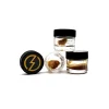Three jars of High Voltage Extracts Live Resin displayed in various positions. The black lids feature a yellow lightning bolt logo, with one jar open showcasing the live resin inside