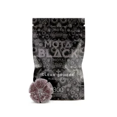 A black Mota Black THC Clear Sphere package with a visible gummy sphere on the side. The package indicates a 300mg THC content in a black cherry flavor, with decorative white patterns covering the black background