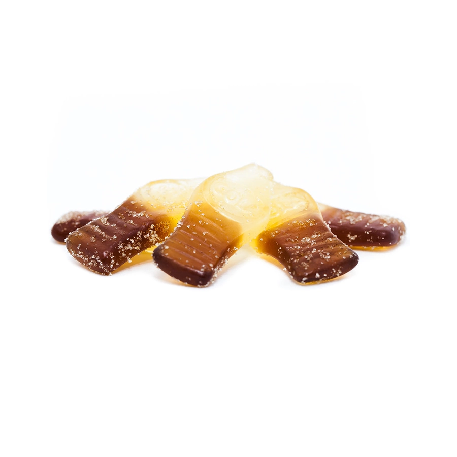 A close-up of MOTA Cola Bottles gummies showing the classic cola bottle shape with a sugar coating