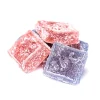 Close-up of MOTA THC Wild Berry Jellies from Weed Market in red and purple gummy squares
