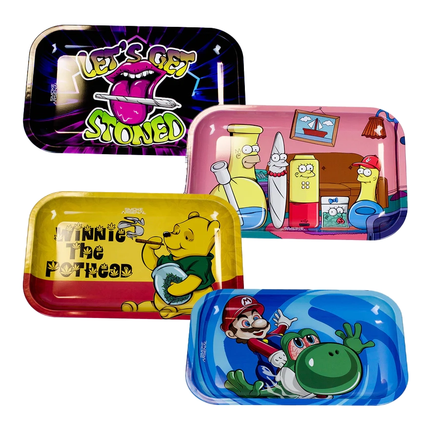 A set of four colorful Smoke Arsenal medium-sized rolling weed trays. The top left tray has a bold "Let's Get Stoned" design with a graphic of a pink tongue holding a joint. The top right tray features characters resembling The Simpsons as various smoking-related items like joints and bongs. The bottom left tray showcases a parody of Winnie the Pooh as "Winnie the Pothead" holding a bowl of green buds. The bottom right tray depicts Mario and Yoshi in a vibrant, blue, and cartoon-style design. Each tray has rounded edges and deep walls for easy rolling.