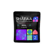 A black pouch showing Shafaas Heal Macrodose Magic Mushroom Capsules with colorful geometric shapes in purple, pink, blue, and green. The front label reads "SHAFAA Magic Mushroom Macrodosing Capsules – Heal" with "4 Capsules" and a "2g" icon, highlighting the product's macrodosing potential