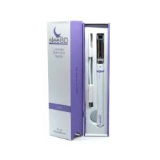 SleeBD Calm Full Spectrum CBD Vape in its packaging. The lavender and white disposable vape pen is neatly displayed inside its box, along with a USB charger. The packaging highlights its ingredients of lavender, spearmint, and vanilla essential oils for relaxation, with the label reading "calm" on the pen and "full spectrum CBD" on the packaging.