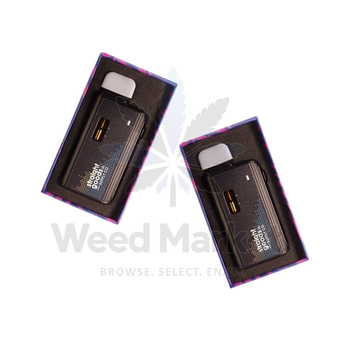Two 3g Straight Goods Vape Pens in Boxes – Top view of two boxed Straight Goods disposable vape pens in black cases with gold accents.