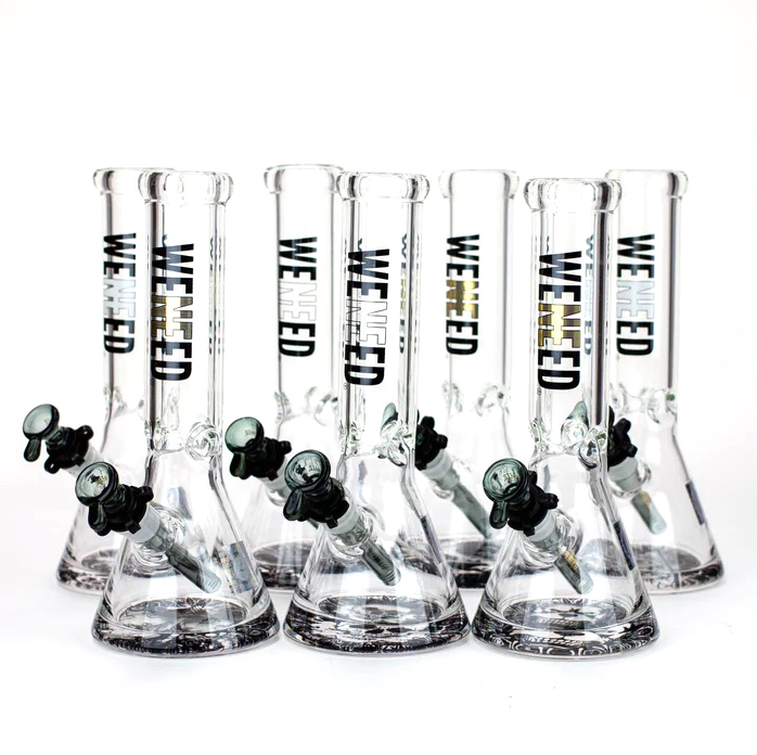 Group photo of six Weneed 12" Nice Glass Bongs standing in a line, showcasing their identical build and design, with green bowls attached.