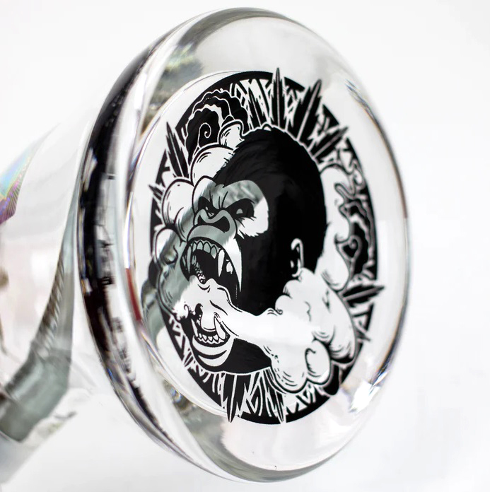 Close-up of a gorilla design at the base of the Weneed 12" Nice Glass Bong, featuring a roaring gorilla within a circular pattern.