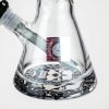 Close-up of the bottom base of the Weneed 12" Nice Glass Bong, with an intricate design featuring a skull pattern at the base.