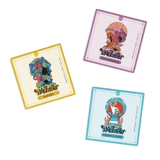 Three 3g Wonder Psilocybin Magic Mushroom Chocolates in flavors of Hazelnut, Milk Chocolate, and Cookies 'n Creme, each featuring colorful, psychedelic packaging