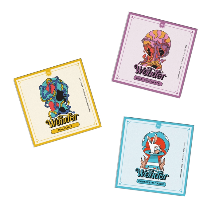 Three 3g Wonder Psilocybin Magic Mushroom Chocolates in flavors of Hazelnut, Milk Chocolate, and Cookies 'n Creme, each featuring colorful, psychedelic packaging