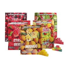 A collection of Burn Bites cannabis-infused gummies 250mg THC featuring assorted flavors, including Strawberry, Mango, Mixed Fruit, and Watermelon, with colorful packaging and piles of gummy squares in matching colors.