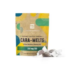 Packaging of Twisted Extracts Gourmet Salted Caramel Cara-Melts 300mg CBD alongside individually wrapped caramels.