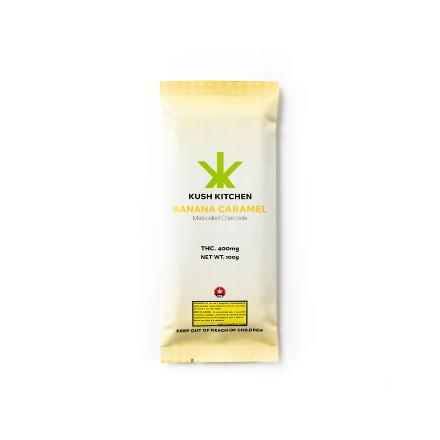 Kush Kitchen Banana Caramel THC Chocolate Bar 400mg Milk chocolate infused with banana and caramel in a soft yellow package