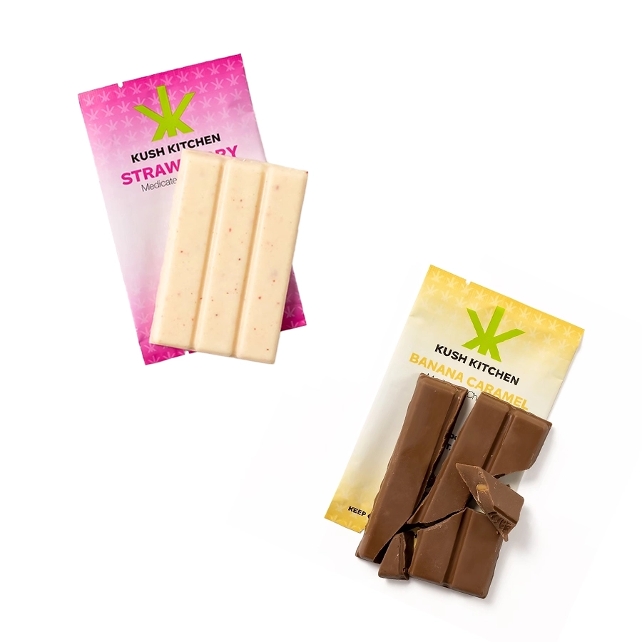 Kush Kitchen mini THC Chocolate Bars in Strawberry and Banana Caramel unwrapped showing white and milk chocolate with 200mg THC on vibrant packaging.